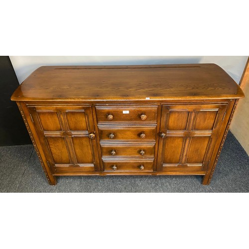 773 - Vintage Ercol sideboard, four drawers and two doors. [90x145x51cm]