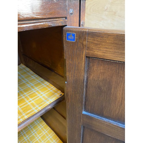 773 - Vintage Ercol sideboard, four drawers and two doors. [90x145x51cm]