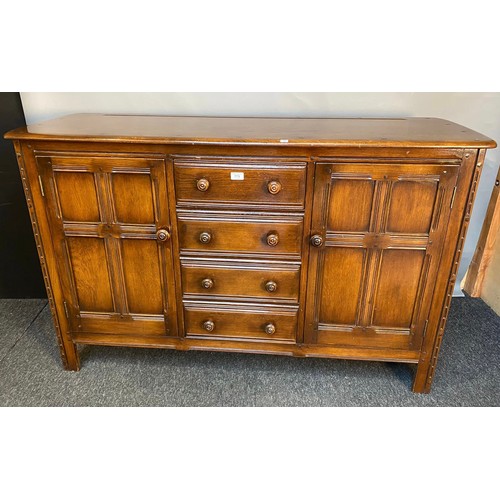 773 - Vintage Ercol sideboard, four drawers and two doors. [90x145x51cm]