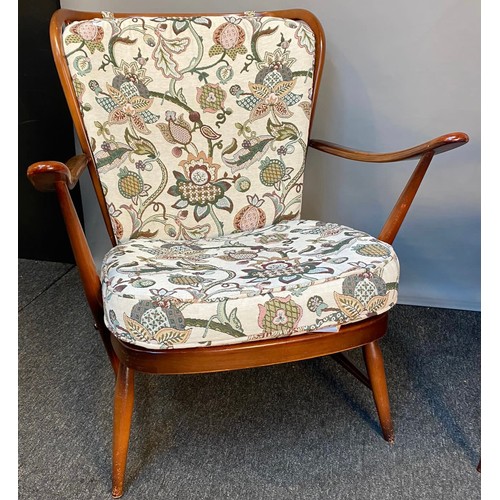 771 - Vintage 'His and Her' Ercol armchairs with original cushions.