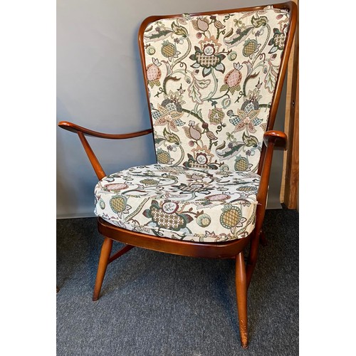 771 - Vintage 'His and Her' Ercol armchairs with original cushions.