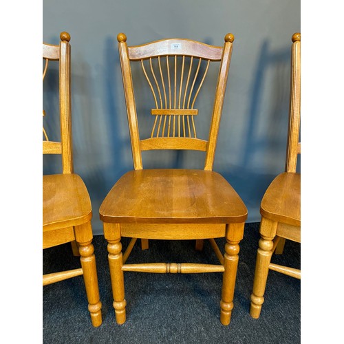 768 - Four contemporary hardwood dining chairs.