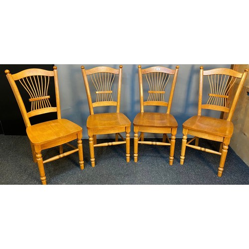 768 - Four contemporary hardwood dining chairs.