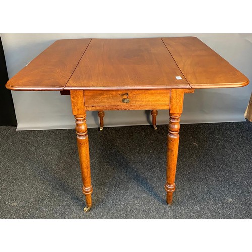 767 - 19th century mahogany drop end sofa table, the rectangular top raised on turned legs ending in brass... 