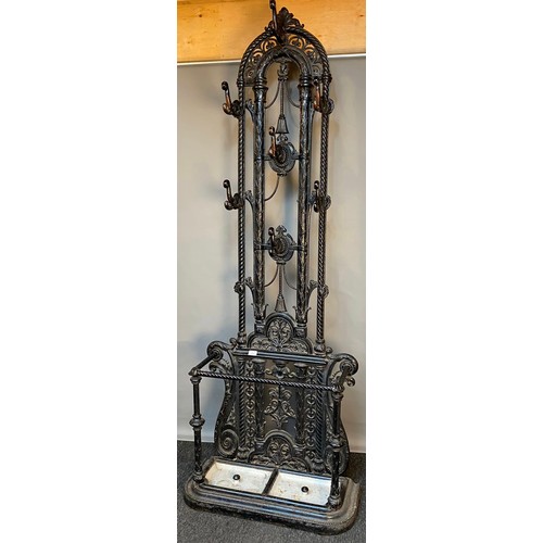 757 - 19th century 'Canon Works' [Falkirk] cast iron coat stand with cast iron drip tray inserts. [207x76x... 