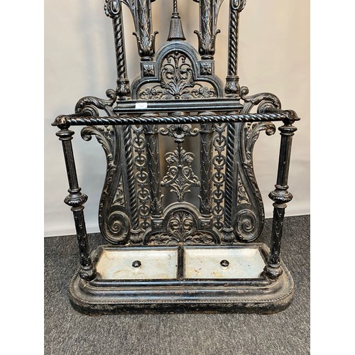 757 - 19th century 'Canon Works' [Falkirk] cast iron coat stand with cast iron drip tray inserts. [207x76x... 