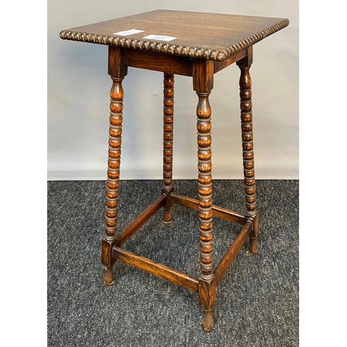 751 - Early 1900's arts and crafts small side table, raised on  turned legs with peripheral stretchers  [4... 