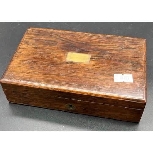 7 - Small Rosewood style box containing various odds. Two pen knives, Acme Whistle and one other.