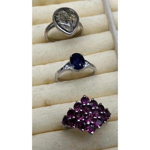 9 - A Lot of 5 various 925 silver and gem stone rings. Includes Sapphire and white topaz ring & Orange t... 