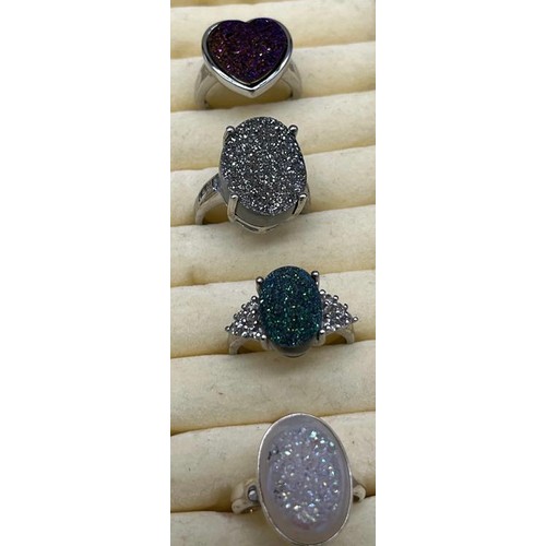 10 - A Lot of 5 various 925 silver and gem stone rings.