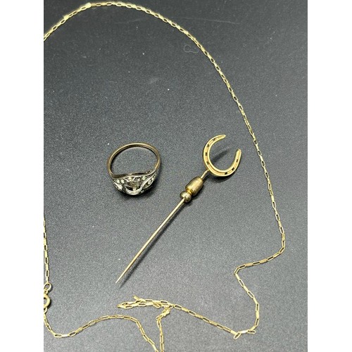 11 - 9ct Yellow gold horse shoe pin brooch, 9ct yellow gold necklace and 9ct yellow gold ring- missing st... 