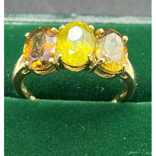 17 - A Ladies 10ct yellow gold ring set with three large oval cut tourmaline stones. [Ring size R] [2.99G... 