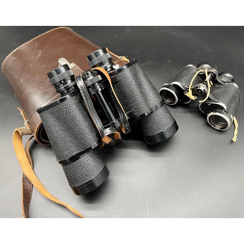 576 - Two pair of vintage binoculars to include makers Charles Frank 10x50 with leather case and WW2 Diens... 