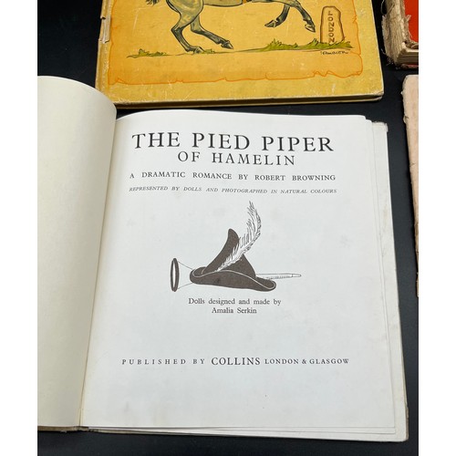 704 - Four various children's books: The Pied Piper of Hamelin- copyright 1944- produced by Adprint Limite... 