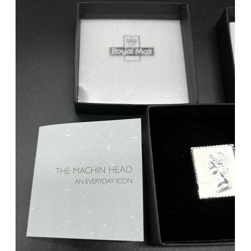 20A - Two Royal Mail 'The Machin Head' pin badges. comes with box and booklet.