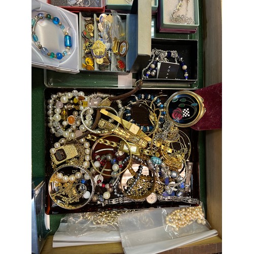 22A - A Large quantity of costume jewellery to include necklaces, bangles, pearls and musical wooden jewel... 