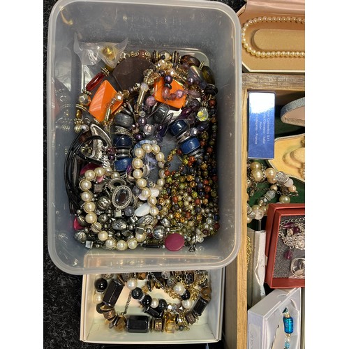 22A - A Large quantity of costume jewellery to include necklaces, bangles, pearls and musical wooden jewel... 