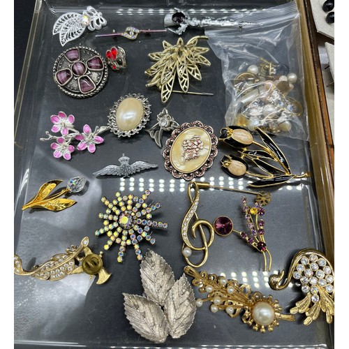 23A - A Collection of earrings and brooches to include RAF Sweetheart brooch etc