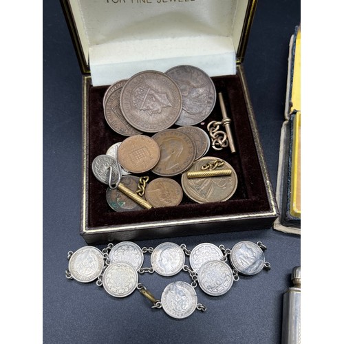 27 - Selection of odds to include coins, coin bracelet, Empire Exhibition Scotland 1938 badge, Colibri Mo... 