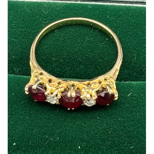 507 - Antique 18ct yellow gold Ruby and diamond ring. Consists of 1 round and 2 oval cut rubies. and 2 rou... 