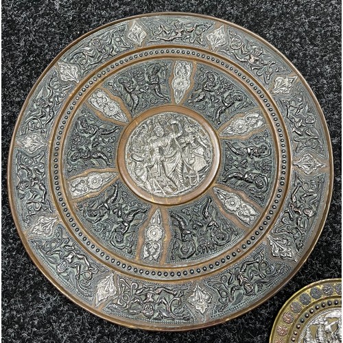 581 - A Lot of three 19th century middle east ornate plaques, silver, brass and copper designs. Showing va... 