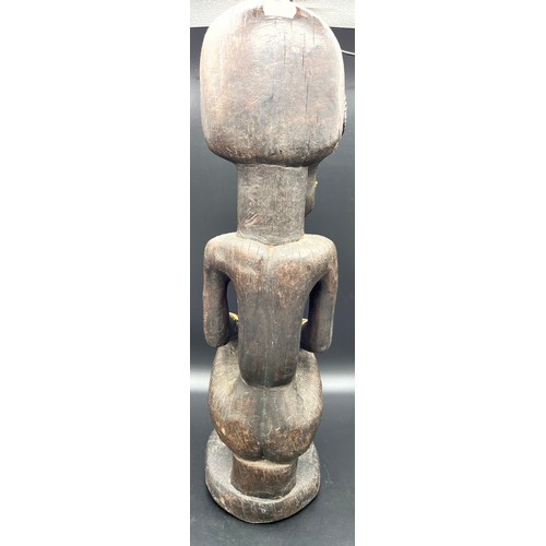 584 - Two large African hand carved tribal figures. [Tallest 54cm]