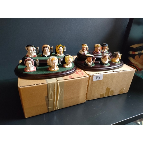 832 - A Collection of Royal doulton miniature Toby jugs king Henry 6 wives on display stand together with ... 