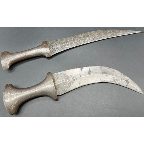 541 - Two Antique decorative daggers. One possibly an Ottoman Dagger- engraved handle and blade. Curved bl... 