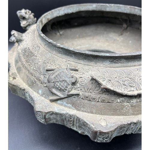 596 - Antique heavy bronze Asian inspired burning censor pot. Designed with raised relief dragon, toad and... 