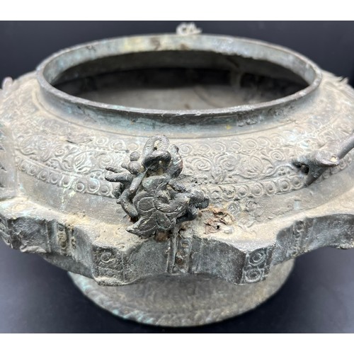 596 - Antique heavy bronze Asian inspired burning censor pot. Designed with raised relief dragon, toad and... 