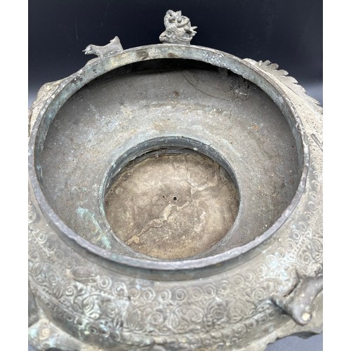 596 - Antique heavy bronze Asian inspired burning censor pot. Designed with raised relief dragon, toad and... 