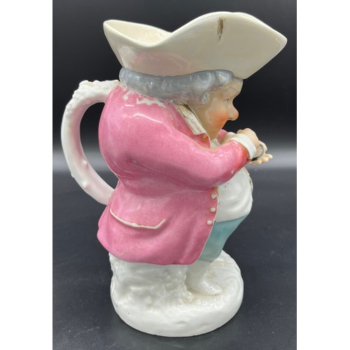 598 - 19th century Character Toby Jug of a man taking snuff. [Signed JP] [Restored to hat area] [24cm high... 