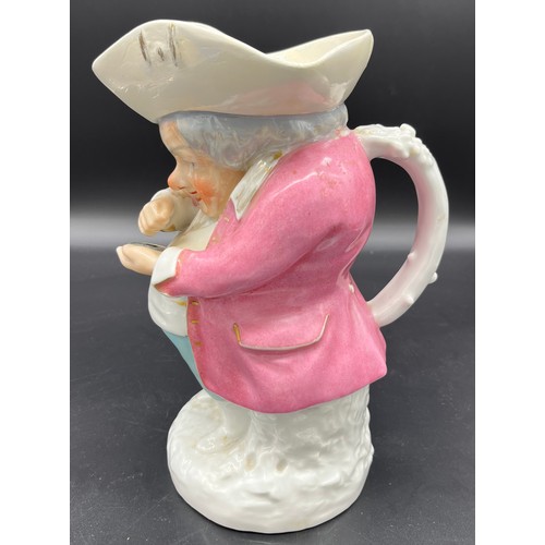 598 - 19th century Character Toby Jug of a man taking snuff. [Signed JP] [Restored to hat area] [24cm high... 