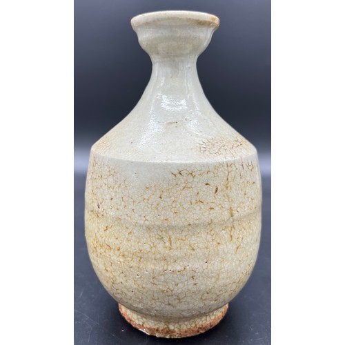 600 - Antique Chinese Guan- type vase, with a greyish crackled celadon glaze, raised on a short foot. [17c... 