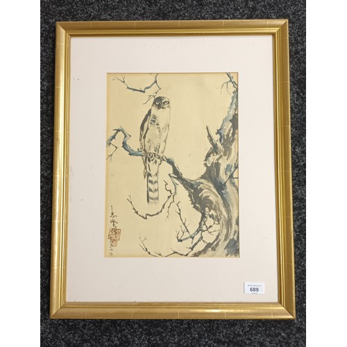 689 - Framed Chinese watercolour depicting a bird of prey perched on a branch. Signed. 
 [58x46cm]