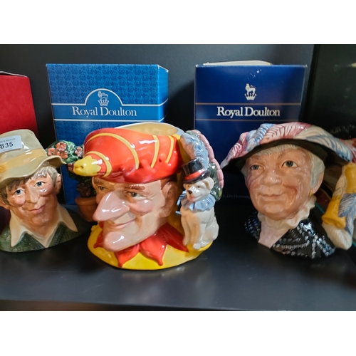 835 - A collection of Royal doulton Toby character jugs includes punch and Judy , pearly queen , Scaramouc... 