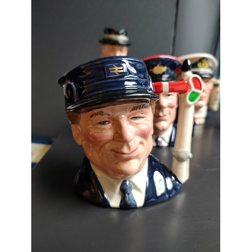 843 - A Collection of small Royal doulton Toby jugs includes Winston Churchill , the Canadian sailor , Rip... 