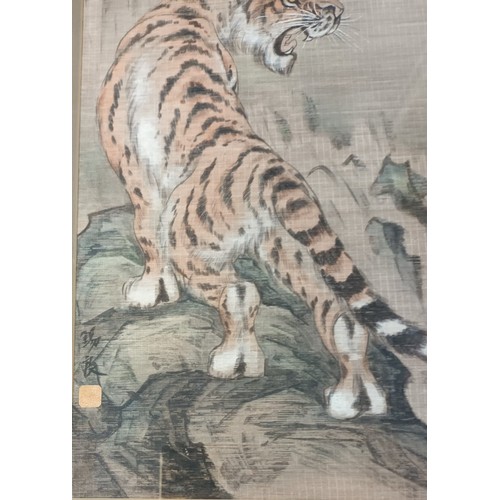 688 - Chinese Framed hand painted panel on a screen depicting a tiger, signed [84x45cm]