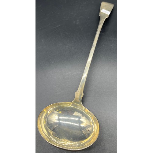 500A - A Georgian Edinburgh silver large ladle produced by Andrew Wilkie. [36cm in length]