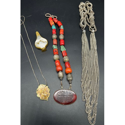 513 - A Selection of Indian jewellery items to include Silver, coral, turquoise and red agate necklace. Gi... 