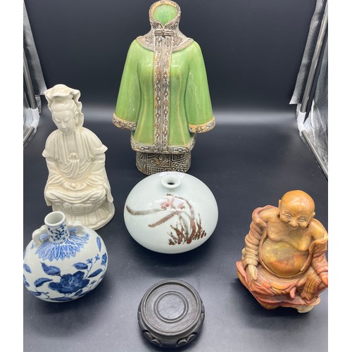 611 - A Selection of oriental wares to include tunic pottery vase, Blanc de Chine buddha figure, Soapstone... 