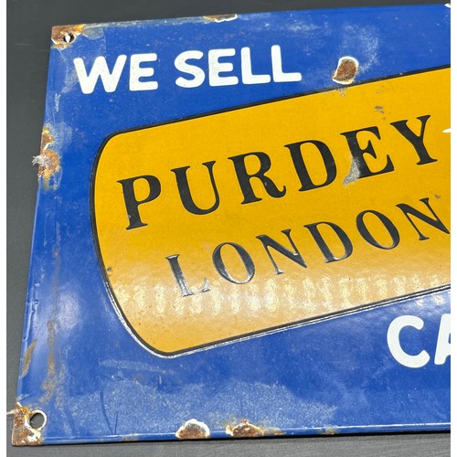 526 - Vintage Enamel gun ammo advertising sign. 'We Sell Purdey London Cartridges' [20.3x30.2cm]