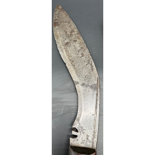 527 - A WW2 Military Issue Kukri Knife. Marked with military arrow and K45. Curved wooden handle and steel... 