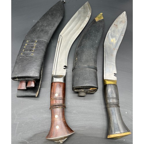 528 - Two Kukri Knives with sheathes.