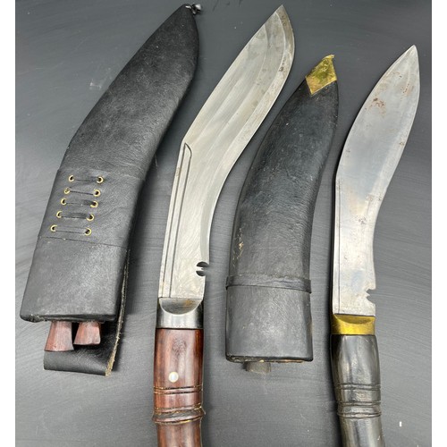 528 - Two Kukri Knives with sheathes.