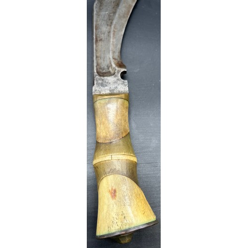 529 - Antique Kukri Knife, Designed with a bone and horn handle. Curved steel blade.