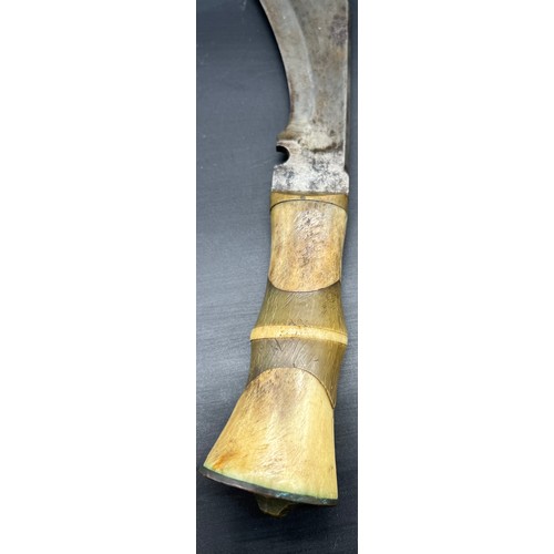 529 - Antique Kukri Knife, Designed with a bone and horn handle. Curved steel blade.