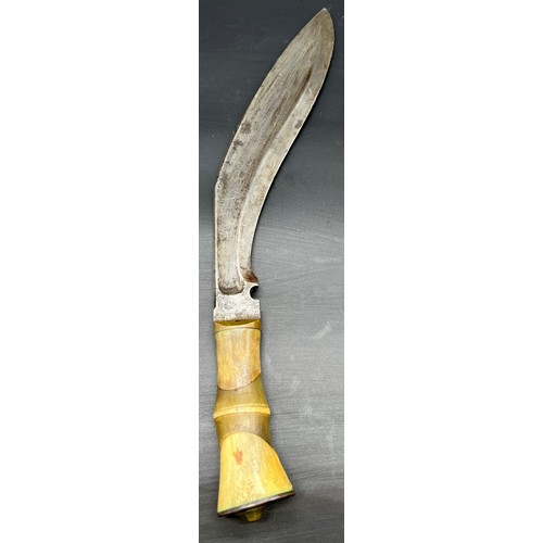 529 - Antique Kukri Knife, Designed with a bone and horn handle. Curved steel blade.