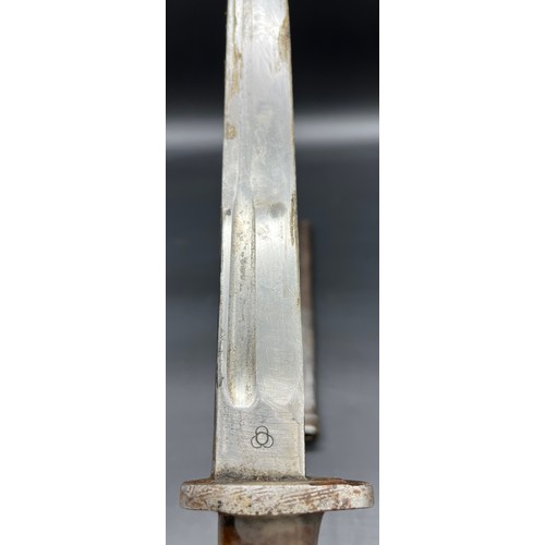 530 - Military bayonet/ dagger, designed with a pin up girl handle under resin. Comes with a protective sc... 