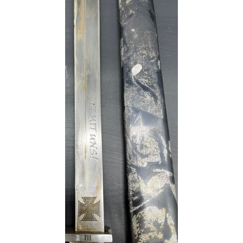 531 - A German (butcher) Mauser Bayonet, engraved iron cross and saying to blade. Comes with metal scabbar... 